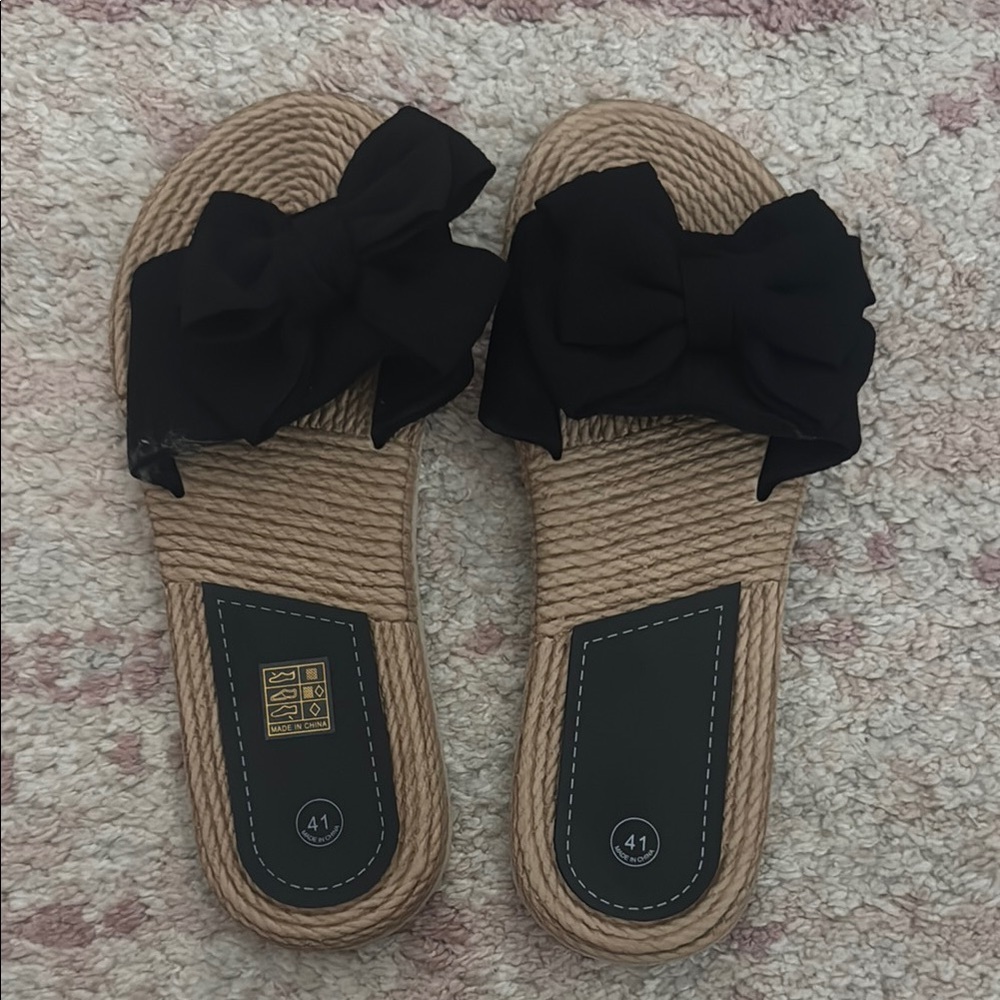 Black Bow Women’s Sandals
Never worn size 
Size 8.5-9